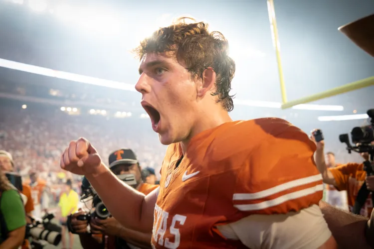 Texas coach Sarkisian: Dropped ball with Rowe